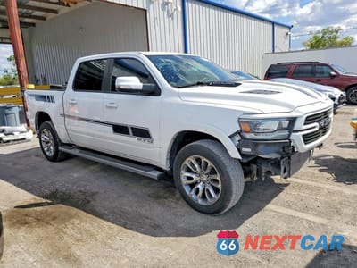 Czwarte zdjęcie samochodu z boku: 2022 RAM 1500 LARAMIE VIN:1C6RREJM4NN260821 - miniatura