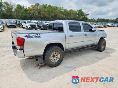 Trzecie zdjęcie samochodu z tyłu: 2023 TOYOTA TACOMA SR V6 VIN:3TMCZ5AN4PM578698 - miniatura