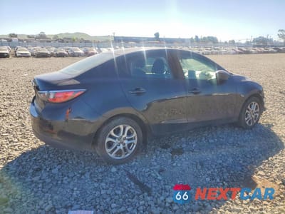 Trzecie zdjęcie samochodu z tyłu: 2016 SCION IA BASE VIN:3MYDLBZV3GY143464 - miniatura