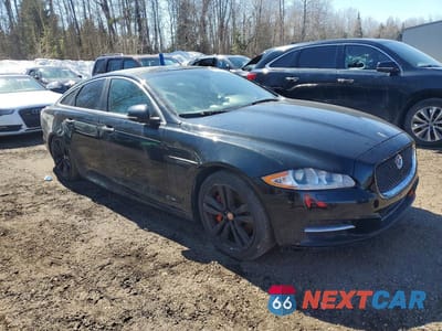 Czwarte zdjęcie samochodu z boku: 2015 JAGUAR XJ VIN:SAJXJ1CD0F8V90504 - miniatura