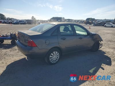 Trzecie zdjęcie samochodu z tyłu: 2006 FORD FOCUS VIN:1FAFP34N46W188482 - miniatura