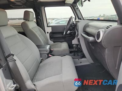 Zdjęcie 11 z 12 samochodu: 2008 JEEP WRANGLER SAHARA VIN:1J8FA54128L589692 - miniatura