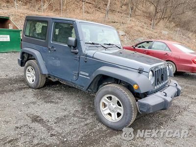 Czwarte zdjęcie samochodu z boku: 2017 JEEP WRANGLER SPORT VIN:1C4AJWAG1HL587951 - miniatura