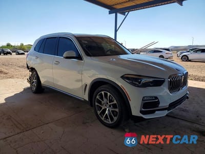 Czwarte zdjęcie samochodu z boku: 2021 BMW X5 SDRIVE 40I VIN:5UXCR4C04M9G39054 - miniatura