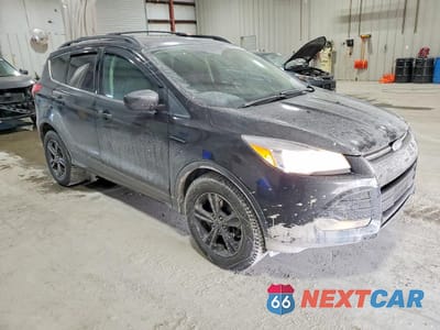Czwarte zdjęcie samochodu z boku: 2015 FORD ESCAPE SE VIN:1FMCU9GX8FUB23387 - miniatura