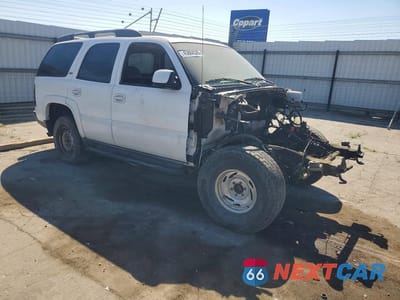 Czwarte zdjęcie samochodu z boku: 2005 CHEVROLET TAHOE K1500 VIN:1GNEK13T85R209864 - miniatura