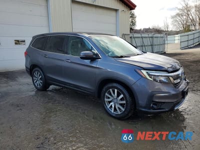 Czwarte zdjęcie samochodu z boku: 2020 HONDA PILOT EXL VIN:5FNYF6H54LB022996 - miniatura