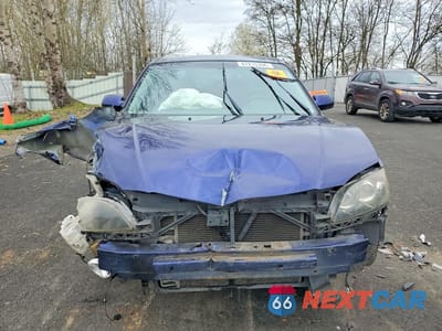 Piąte zdjęcie samochodu w środku: 2005 MAZDA 3 I VIN:JM1BK12FX51349632 - miniatura