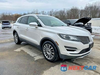 Czwarte zdjęcie samochodu z boku: 2017 LINCOLN MKC RESERVE VIN:5LMCJ3D91HUL46513 - miniatura