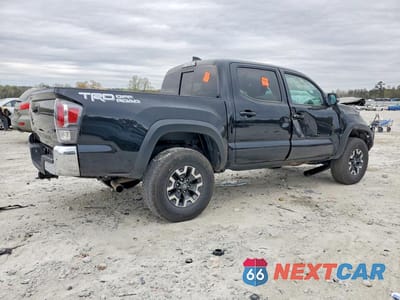 Trzecie zdjęcie samochodu z tyłu: 2021 TOYOTA TACOMA TRD OFF-ROAD VIN:3TMAZ5CN5MM142345 - miniatura