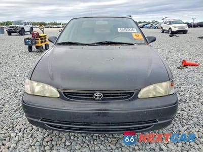 Piąte zdjęcie samochodu w środku: 2000 TOYOTA COROLLA VE VIN:1NXBR12E1YZ323583 - miniatura