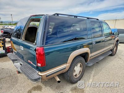 Trzecie zdjęcie samochodu z tyłu: 1996 GMC SUBURBAN K1500 VIN:1GKFK16R2TJ733816 - miniatura