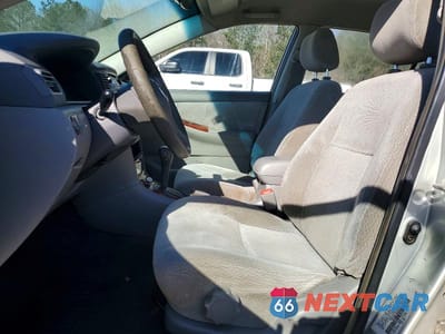 Zdjęcie 7 z 12 samochodu: 2004 TOYOTA COROLLA LE VIN:JTDBR32E742030874 - miniatura