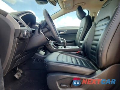Zdjęcie 7 z 14 samochodu: 2021 FORD EDGE SEL VIN:2FMPK3J93MBA43836 - miniatura