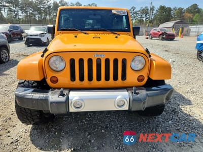 Piąte zdjęcie samochodu w środku: 2012 JEEP WRANGLER UNLIMITED SAHARA VIN:1C4BJWEGXCL133897 - miniatura