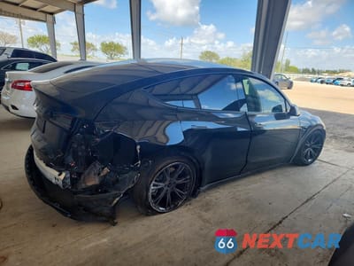 Trzecie zdjęcie samochodu z tyłu: 2024 TESLA MODEL Y VIN:7SAYGDED5RF096775 - miniatura