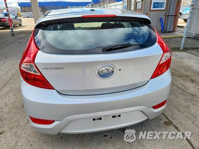 Zdjęcie 6 z 12 samochodu: 2014 HYUNDAI ACCENT SE VIN:KMHCU5AE6EU187829 - miniatura