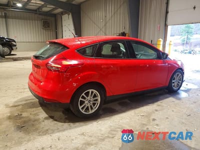 Trzecie zdjęcie samochodu z tyłu: 2017 FORD FOCUS VIN:1FADP3K28HL203957 - miniatura