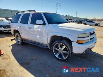 Czwarte zdjęcie samochodu z boku: 2002 CHEV TAHOE K1500 VIN:1GNEK13Z92R212157 - miniatura