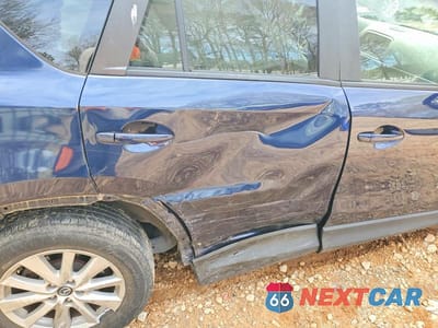 Zdjęcie 10 z 11 samochodu: 2014 MAZDA CX-5 TOURING VIN:JM3KE2CY0E0316388 - miniatura