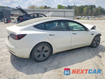 Trzecie zdjęcie samochodu z tyłu: 2021 TESLA MODEL 3 VIN:5YJ3E1EA6MF097458 - miniatura