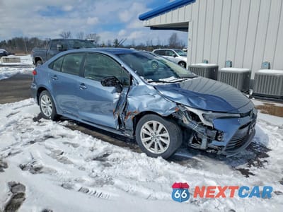 Czwarte zdjęcie samochodu z boku: 2023 TOYOTA COROLLA HYBRID LE VIN:JTDBDMHE8P3003841 - miniatura