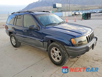 Czwarte zdjęcie samochodu z boku: 2001 JEEP GRAND CHEROKEE LAREDO VIN:1J4GW48S61C590371 - miniatura