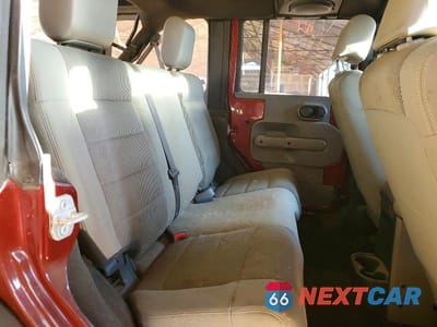 Zdjęcie 10 z 11 samochodu: 2007 JEEP WRANGLER SAHARA VIN:1J4GB59197L208334 - miniatura