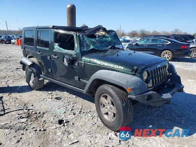 Czwarte zdjęcie samochodu z boku: 2012 JEEP WRANGLER UNLIMITED RUBICON VIN:1C4BJWFG5CL106248 - miniatura
