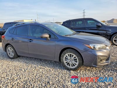 Czwarte zdjęcie samochodu z boku: 2017 SUBARU IMPREZA VIN:4S3GTAB60H3738856 - miniatura