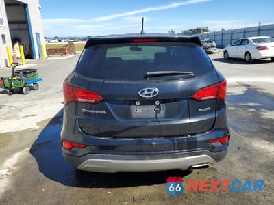Zdjęcie 6 z 12 samochodu: 2018 HYUNDAI SANTA FE SPORT 2.4L VIN:5NMZT3LBXJH082155 - miniatura