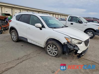 Czwarte zdjęcie samochodu z boku: 2016 MAZDA CX-5 TOURING VIN:JM3KE4CYXG0786300 - miniatura