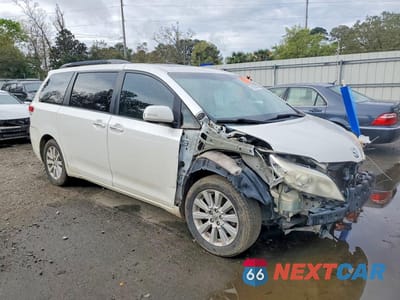 Czwarte zdjęcie samochodu z boku: 2014 TOYOTA SIENNA LIMITED 7-PASSENGER VIN:5TDYK3DCXES447832 - miniatura