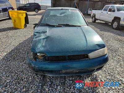 Piąte zdjęcie samochodu w środku: 1997 SUBARU LEGACY L VIN:4S3BD4352V7206219 - miniatura