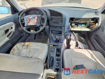 Zdjęcie 8 z 11 samochodu: 1997 BMW 318 I VIN:WBACC9328VEE56697 - miniatura