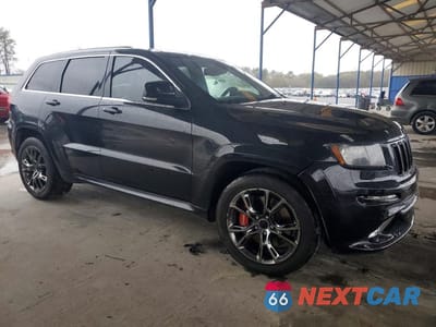 Czwarte zdjęcie samochodu z boku: 2013 JEEP GRAND CHEROKEE SRT-8 VIN:1C4RJFDJ1DC603148 - miniatura