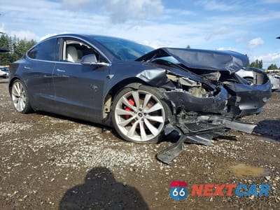 Czwarte zdjęcie samochodu z boku: 2019 TESLA MODEL 3 VIN:5YJ3E1EB2KF367355 - miniatura