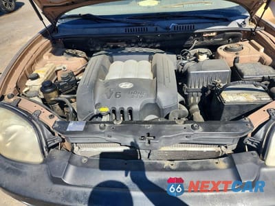 Zdjęcie 12 z 13 samochodu: 2004 HYUNDAI SANTA FE GLS VIN:KM8SC13D04U593034 - miniatura