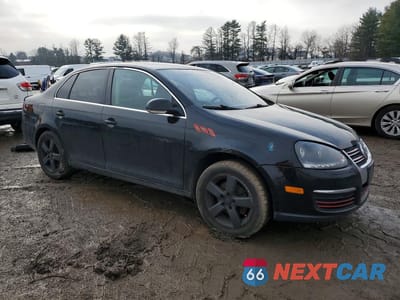 Czwarte zdjęcie samochodu z boku: 2009 VOLKSWAGEN JETTA SE VIN:3VWRZ71KX9M017398 - miniatura
