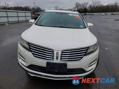 Piąte zdjęcie samochodu w środku: 2015 LINCOLN MKC VIN:5LMCJ2A91FUJ35730 - miniatura