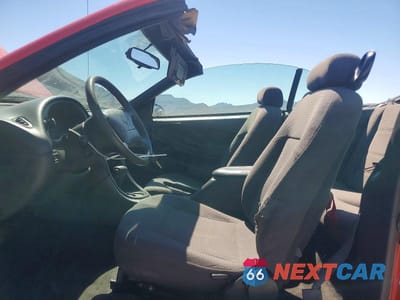 Zdjęcie 7 z 13 samochodu: 2000 FORD MUSTANG VIN:1FAFP4444YF210822 - miniatura