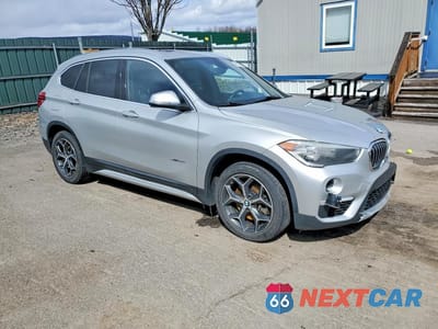 Czwarte zdjęcie samochodu z boku: 2018 BMW X1 XDRIVE28I VIN:WBXHT3C33J5F90142 - miniatura