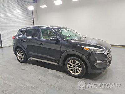 Czwarte zdjęcie samochodu z boku: 2017 HYUNDAI TUCSON SE VIN:KM8J3CA44HU540305 - miniatura