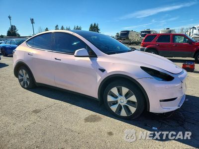 Czwarte zdjęcie samochodu z boku: 2023 TESLA MODEL Y VIN:7SAYGDEE0PF971153 - miniatura