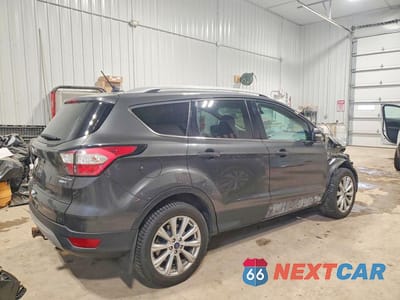 Trzecie zdjęcie samochodu z tyłu: 2018 FORD ESCAPE TITANIUM VIN:1FMCU9J95JUA84647 - miniatura