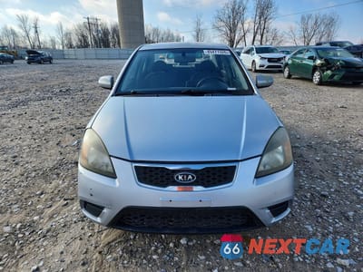 Piąte zdjęcie samochodu w środku: 2011 KIA RIO LX VIN:KNADH4A38B6864690 - miniatura