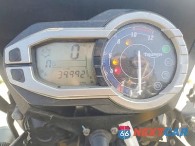 Zdjęcie 7 z 9 samochodu: 2013 TRIUMPH MOTORCYCLE TIGER 800 VIN:SMTE05BF5DT577214 - miniatura