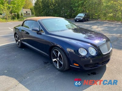Zdjęcie 14 z 14 samochodu: 2007 BENTLEY CONTINENTAL GTC VIN:SCBDR33W17C043914 - miniatura