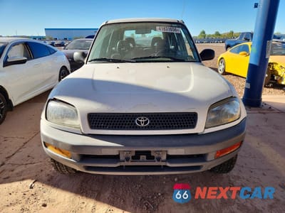 Piąte zdjęcie samochodu w środku: 1997 TOYOTA RAV4 BASE VIN:JT3GP10VXV7017693 - miniatura
