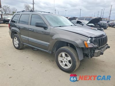 Czwarte zdjęcie samochodu z boku: 2005 JEEP GRAND CHEROKEE LAREDO VIN:1J4GS48K85C665086 - miniatura